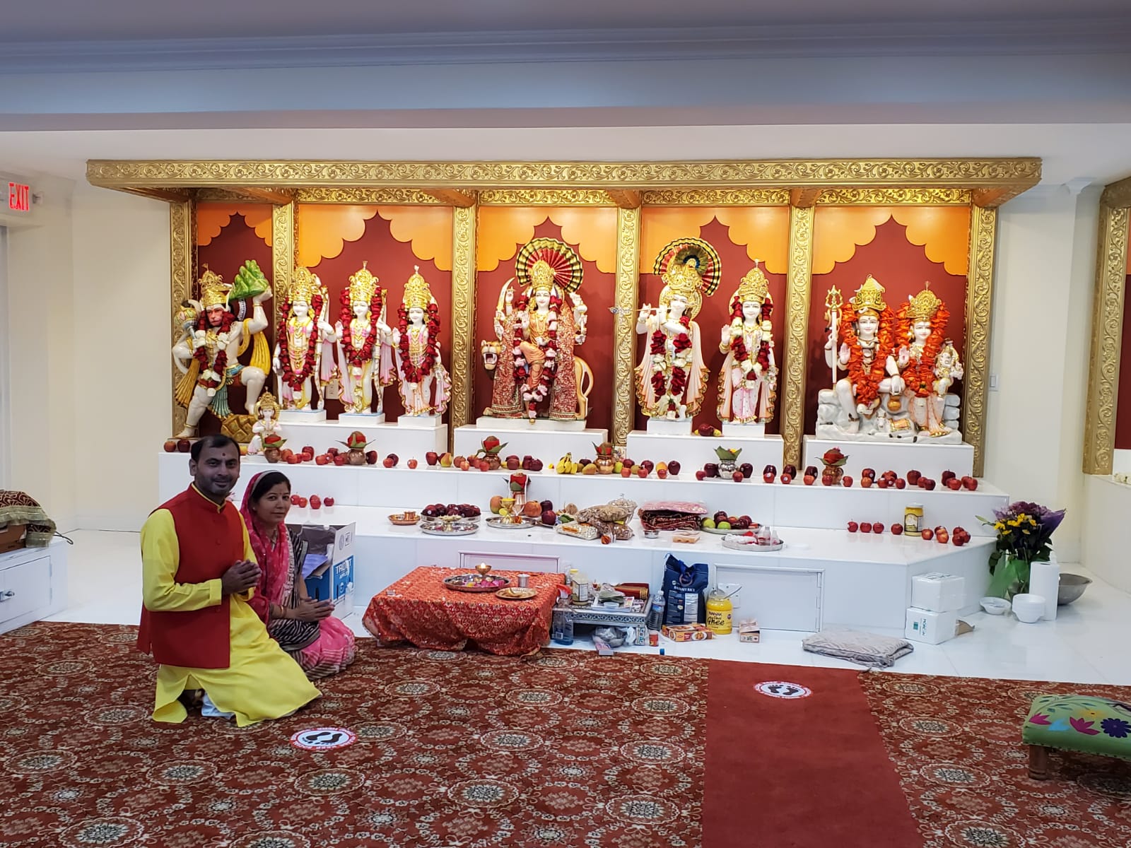 Pandit Harish Sharma at mandir with hindu deities